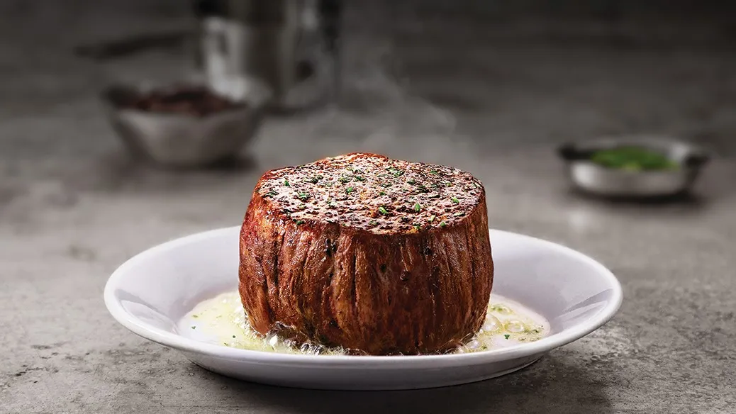 Ruth's Chris Steakhouse signature dishes Petite FiletSeared Ahi TunaCowboy Ribeye
